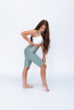 Biker jaspeado deportivo control abdomen color verde olivo