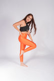 Legging brillante efecto cuero control abdomen color naranja