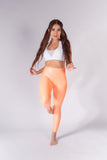 Legging brillante efecto cuero control abdomen color melón neón
