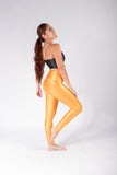 Legging brillante efecto cuero control abdomen color mostaza